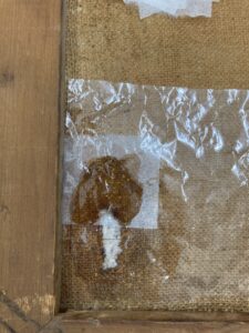 Detalje af bagsiden af det store maleri malet af Christian Aigens under behandling med gel